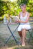 woman dressed in white reading